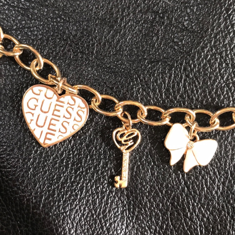 Guess gold charm bracelet